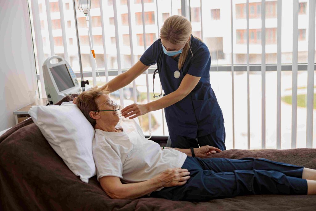 Nurse attending to patient